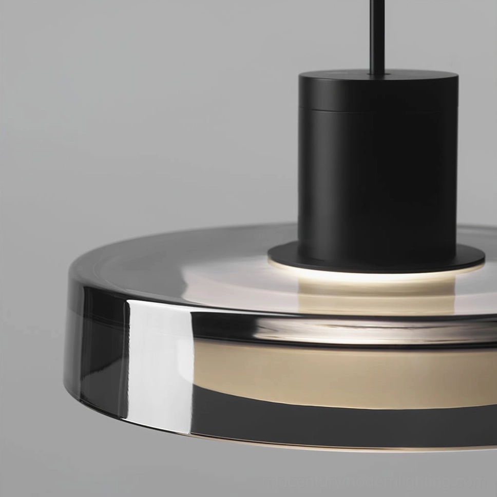 Single Iris pendant creating focal point lighting in minimalist modern living space