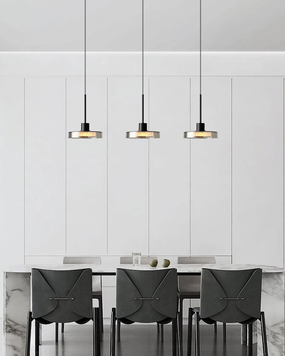 Iris pendant ceiling fixture showing integrated LED warm light and suspended cable installation