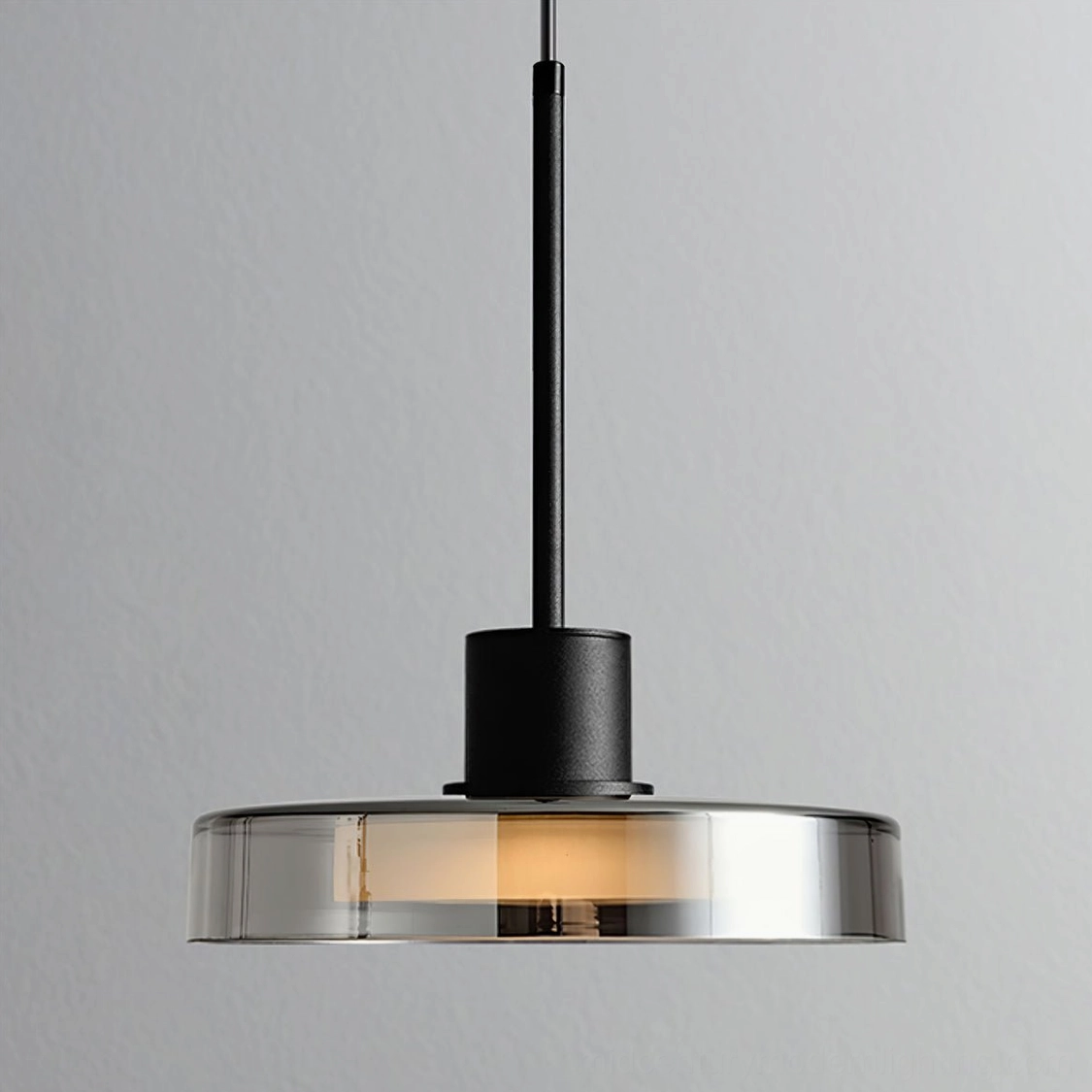 Modern Iris pendant light with matte black frame and smoke grey glass shade close-up