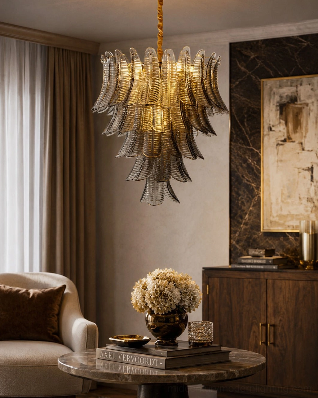 Smoke gray tiered glass chandelier in luxury sitting area with wooden cabinet, warm brass suspension