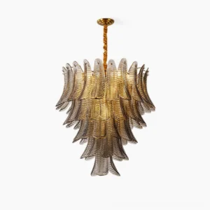 Isolde tiered glass chandelier with amber and gold finish, front view on white background showing organic leaf-inspired layered design