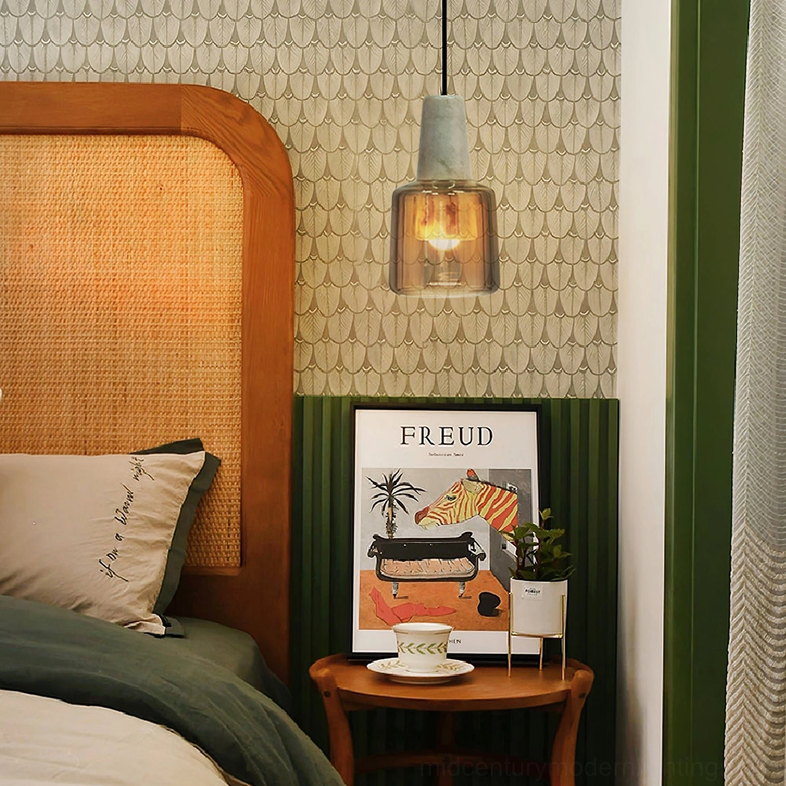 Issa bedside pendant light in bedroom with patterned wallpaper and decorative wall art