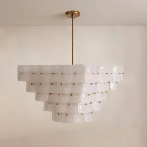 Overhead view of Jacik chandelier displaying stepped glass tile composition and brass suspension rod details