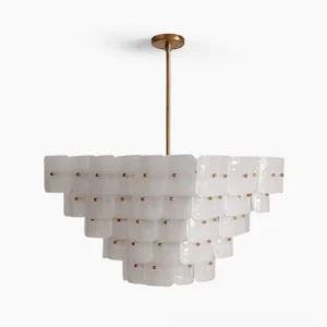 Jacik tiered glass chandelier with brass frame, frontal studio view showing layered frosted and glossy glass panels