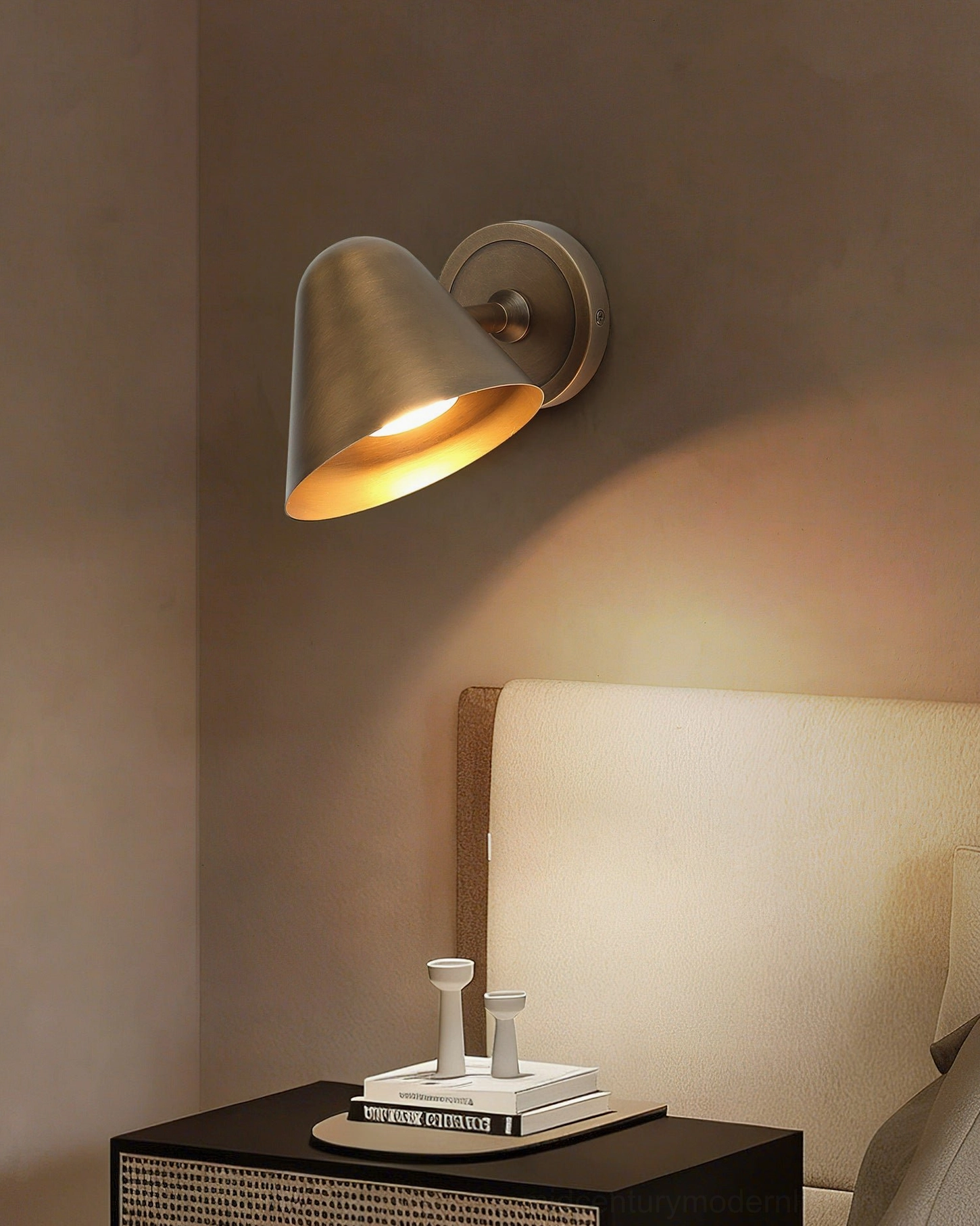Janna Brass Wall Sconce close-up - detailed cone shape and mounting hardware