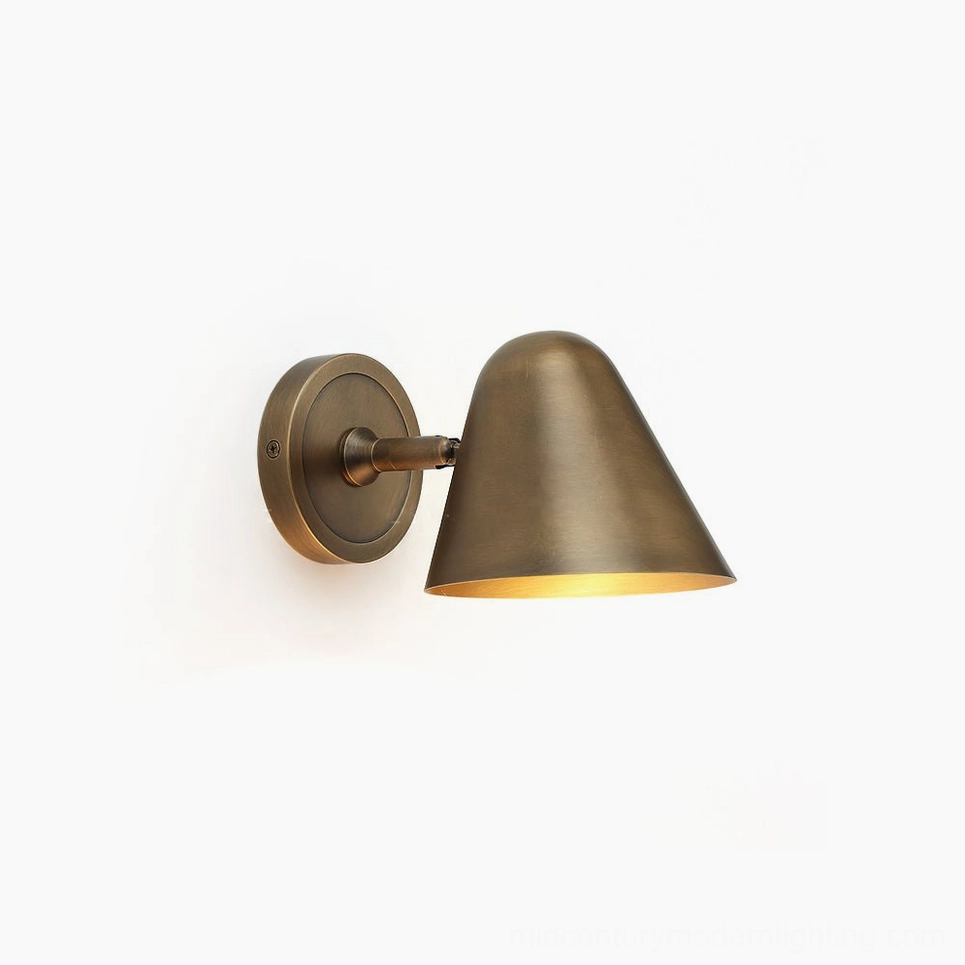 Janna Brass Wall Sconce frontal view - minimalist mid-century modern cone design on white background