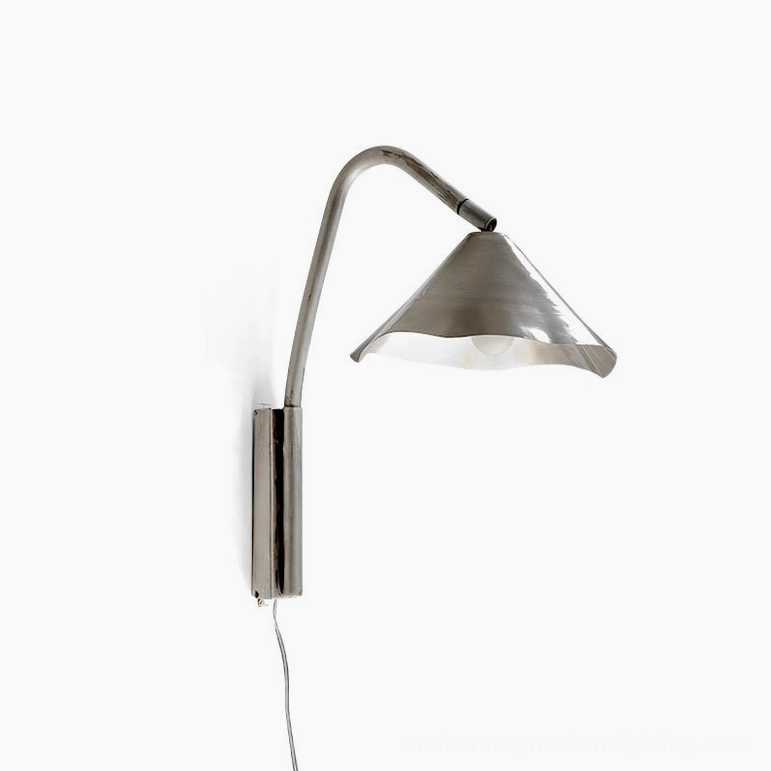 Janna plug-in wall sconce with cord and metal bracket, studio view dark brushed finish