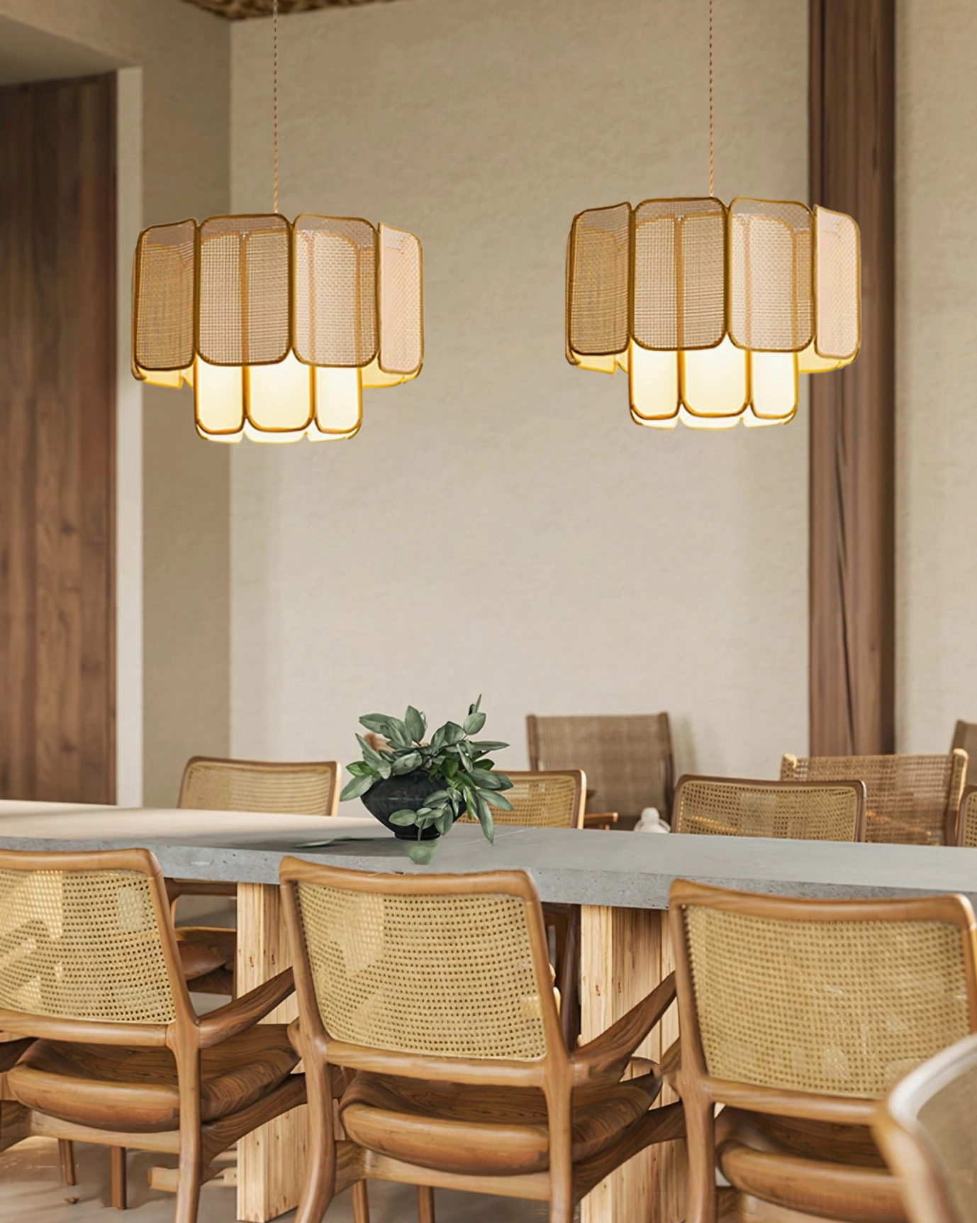 Two beige Jaras rattan pendant lights in modern long dining room with boho warm lighting and natural woven material