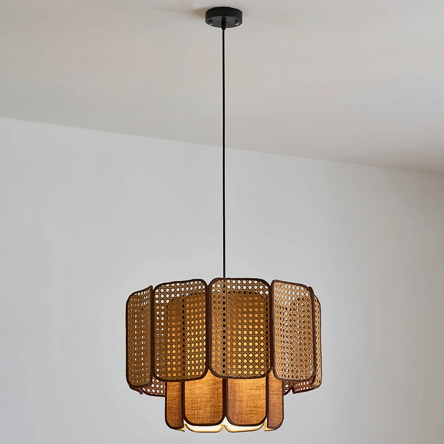 Jaras coffee brown rattan pendant light detail showing scalloped layers and handcrafted construction quality