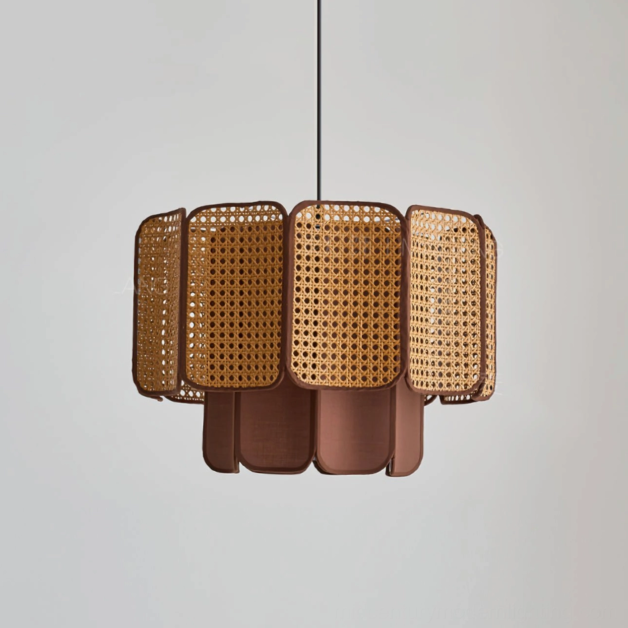 Jaras natural rattan pendant light installation showing proper height above dining table with warm ambient lighting