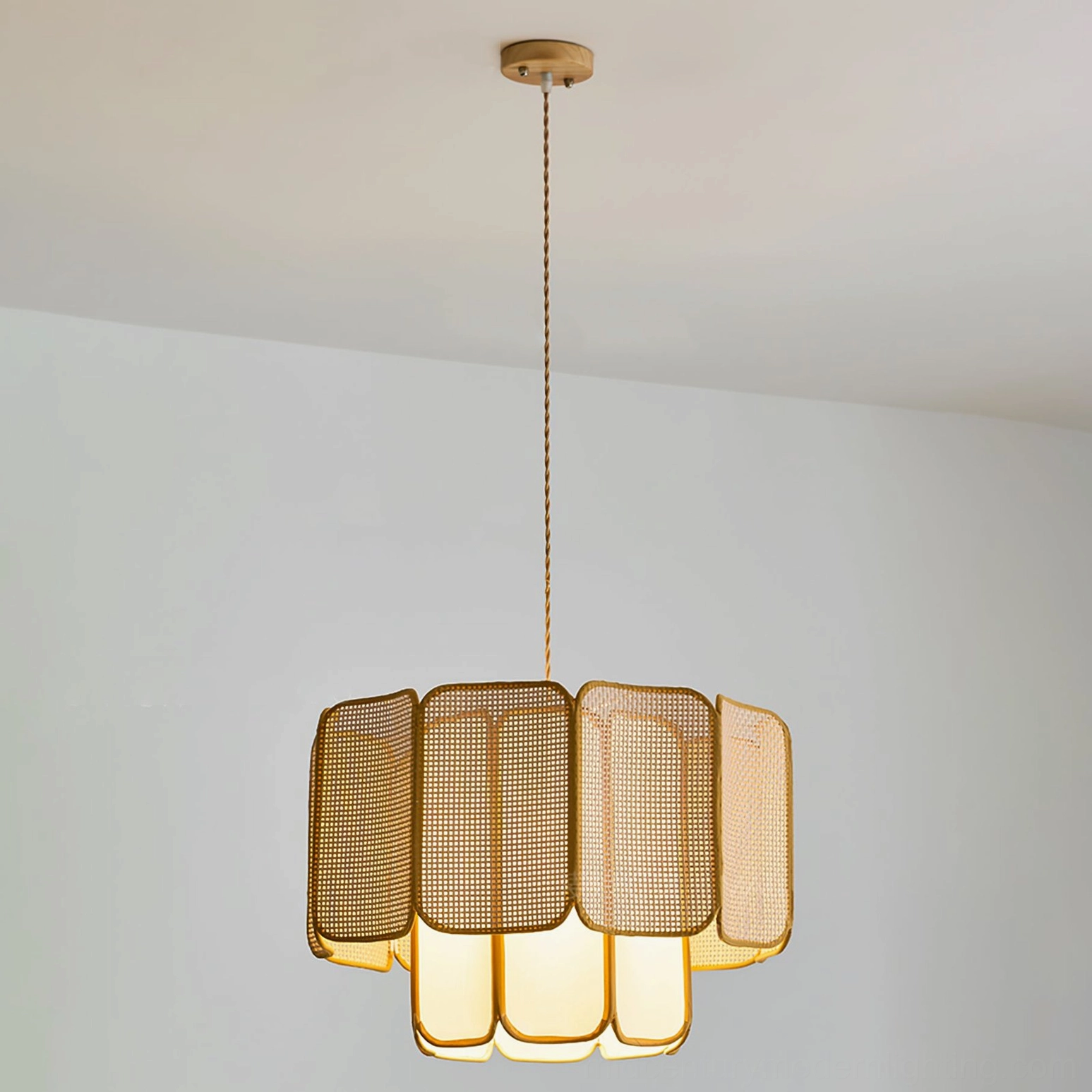 Jaras natural rattan pendant lamp size comparison showing diameter and height proportions in residential setting