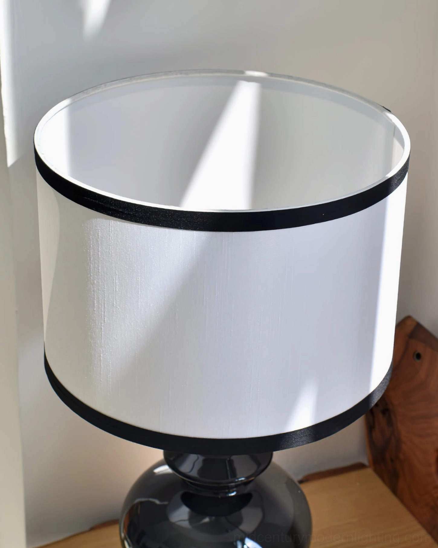Jarrige mid-century modern ceramic lamp, artistic product photography showcasing sculptural base form