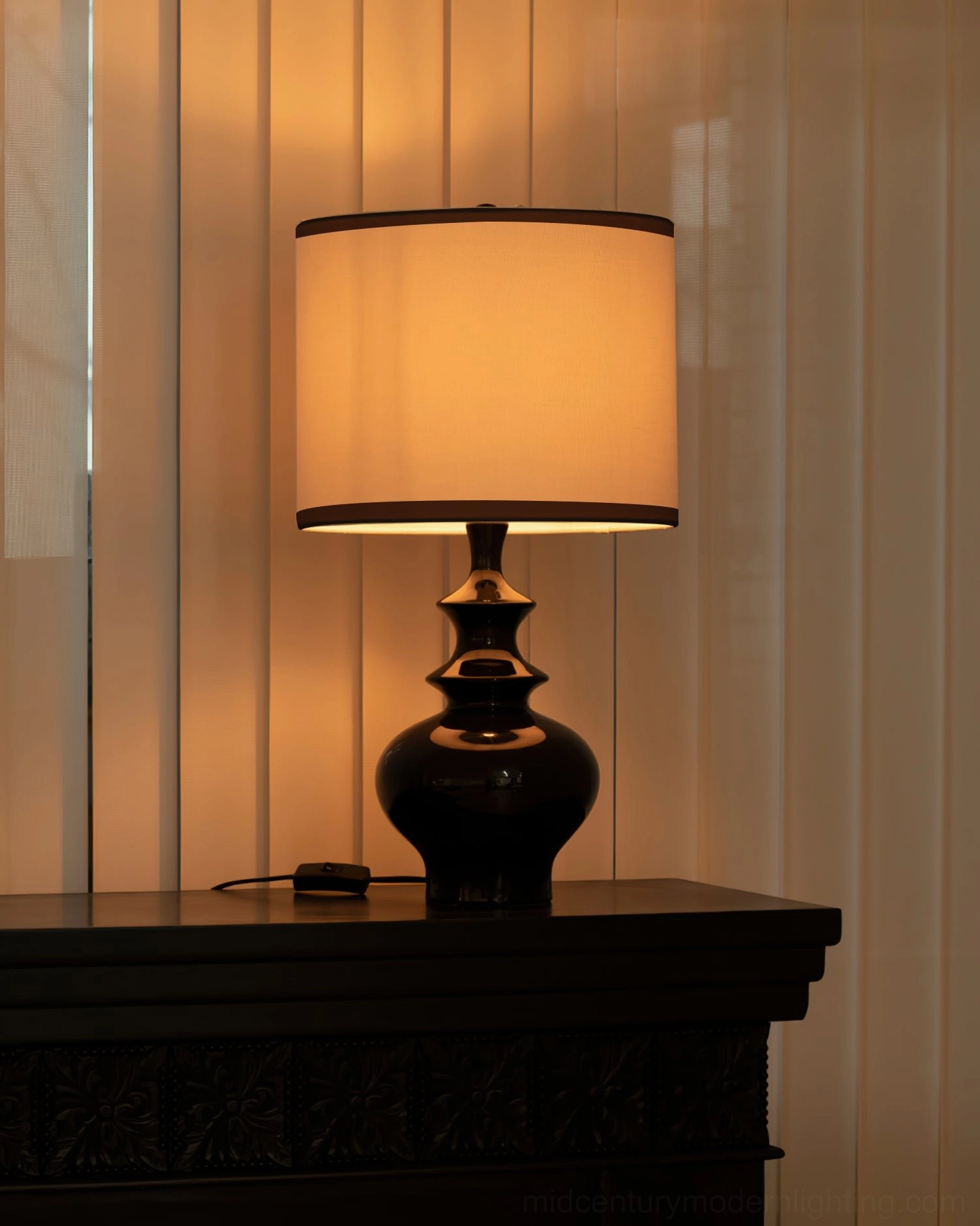 Jarrige ceramic table lamp lifestyle shot in styled interior space, elegant ambient lighting solution