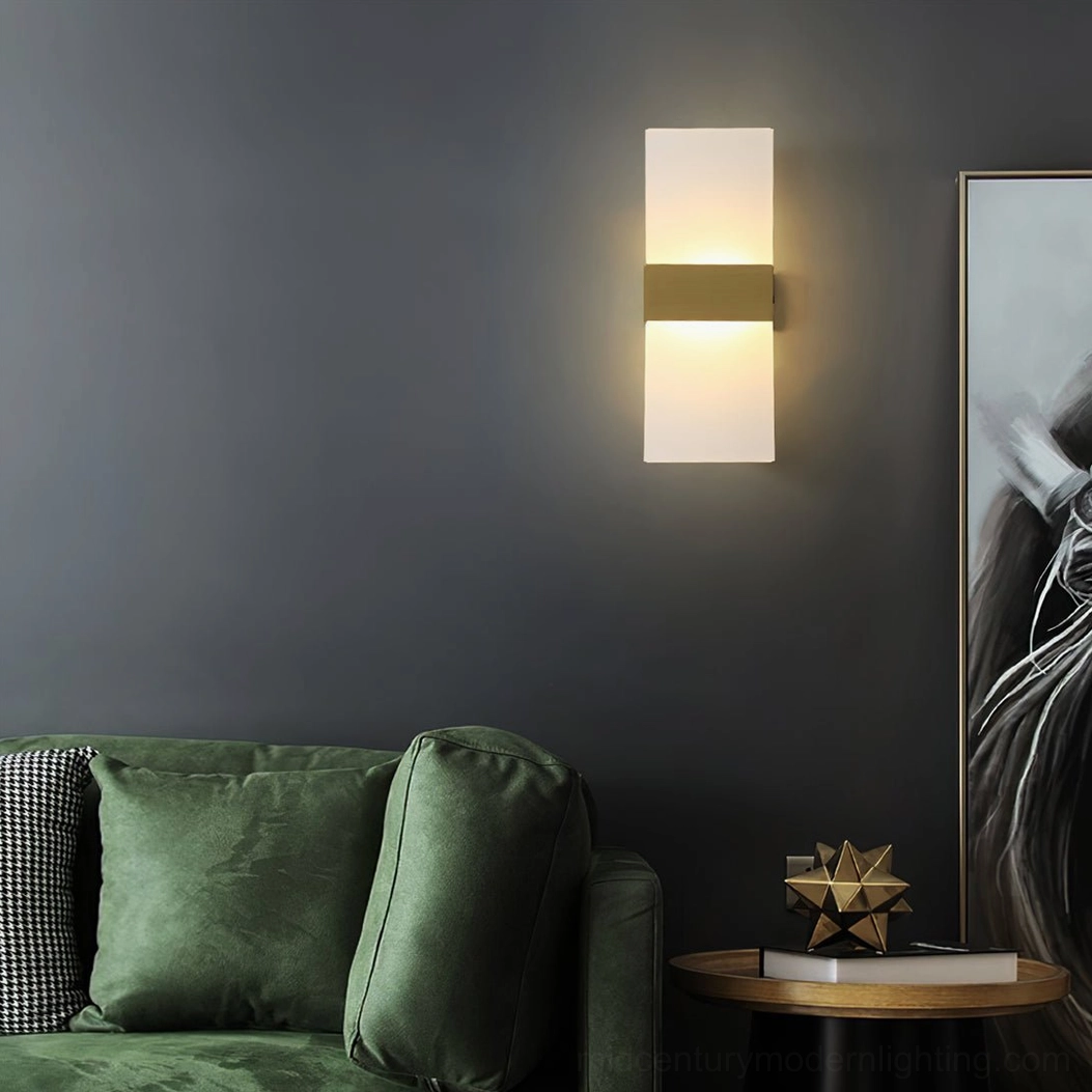 Minimalist wall sconce featuring integrated LED and elegant two-panel shade construction
