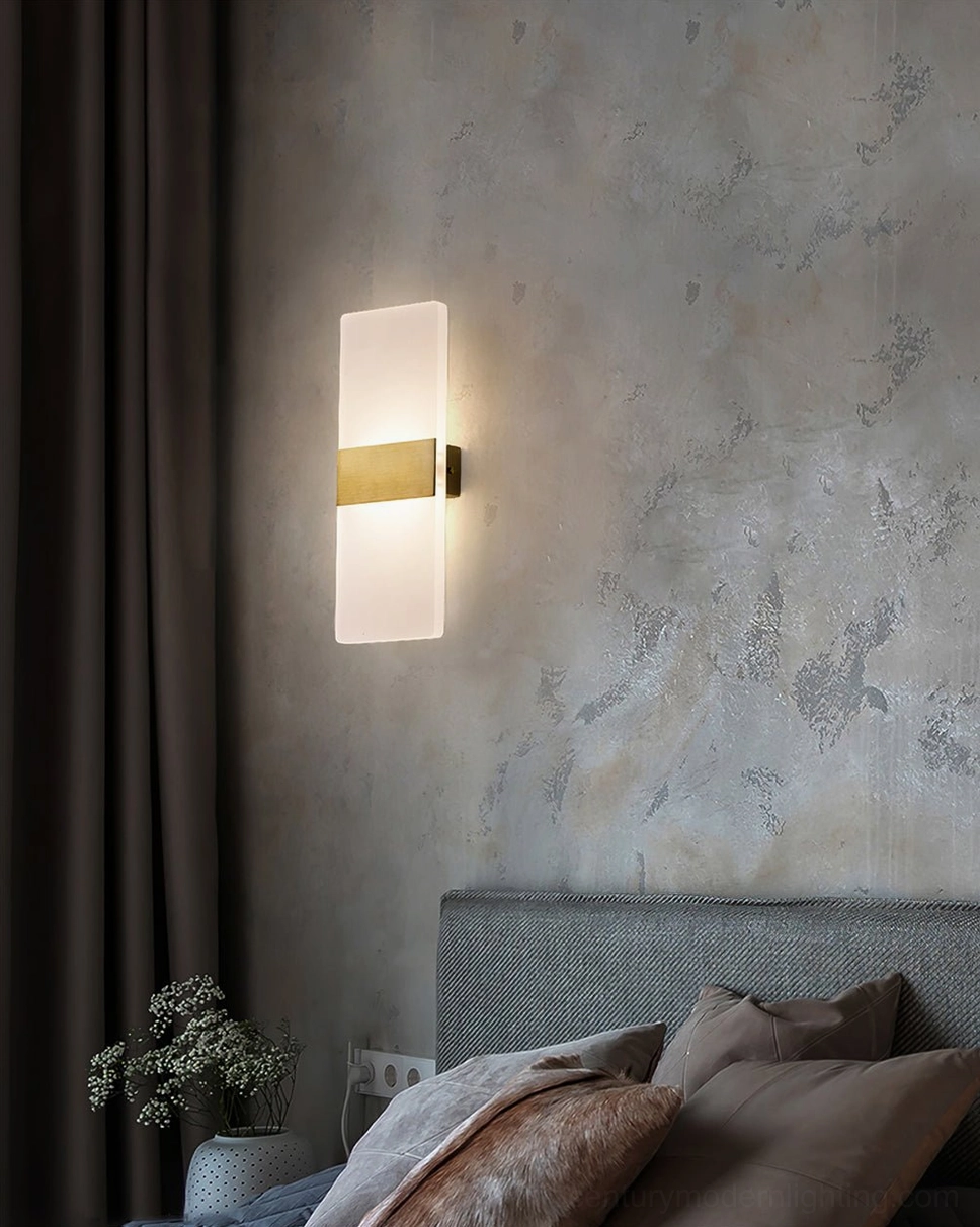 Up-down wall lamp with black middle strip and warm ambient lighting on textured gray wall