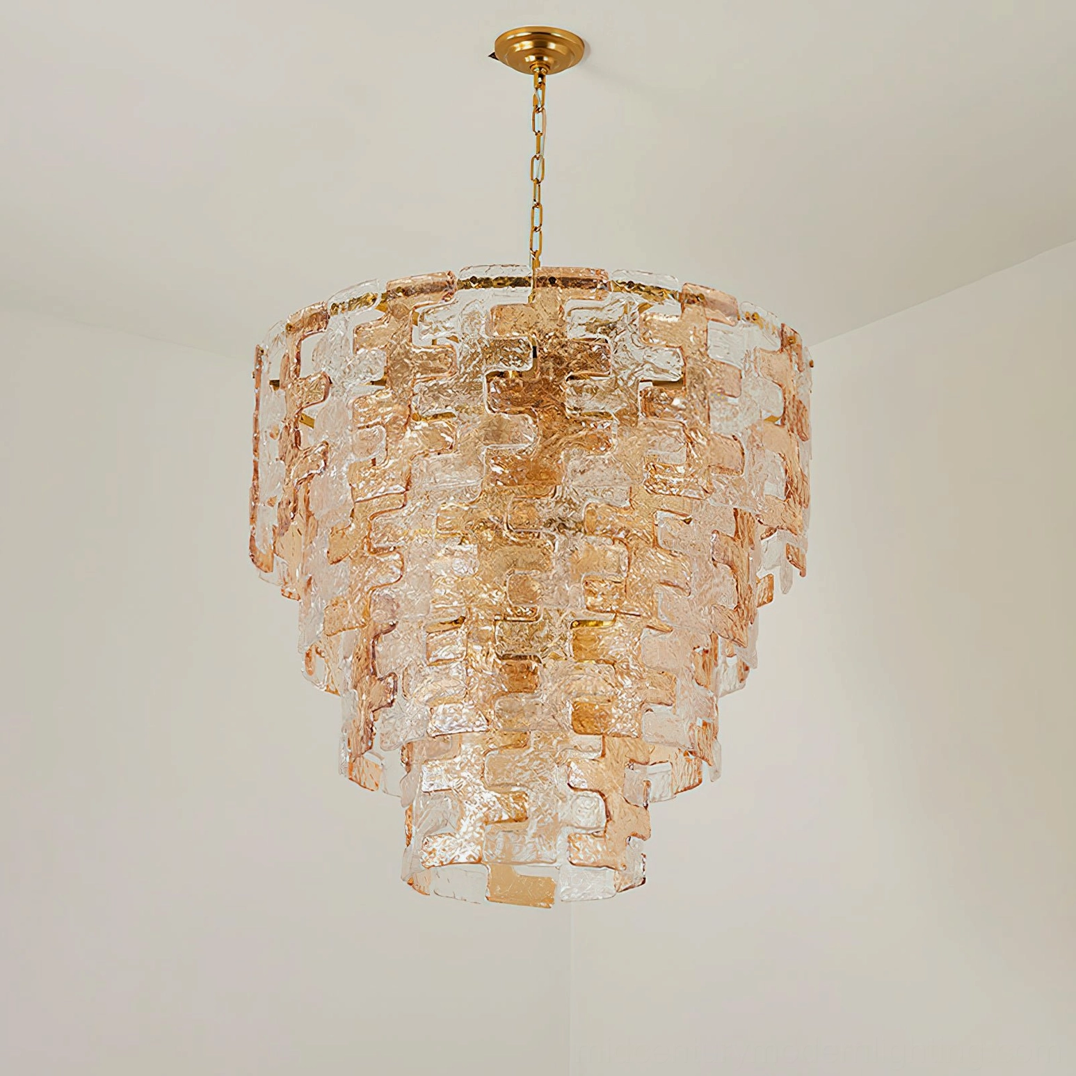 Small Jigsaw tiered glass chandelier with 9 sockets installed in intimate bedroom or dining nook space