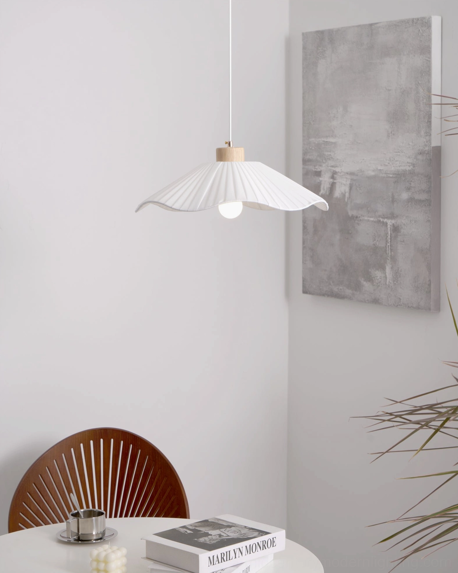 Jimi pleated pendant light side profile view, white fabric shade with natural wood accent, hanging in contemporary dining space