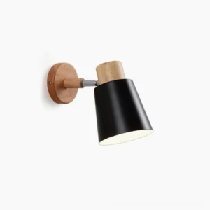 Joan mid-century modern wall lamp with black conical metal shade and solid wood mount, frontal view on white background