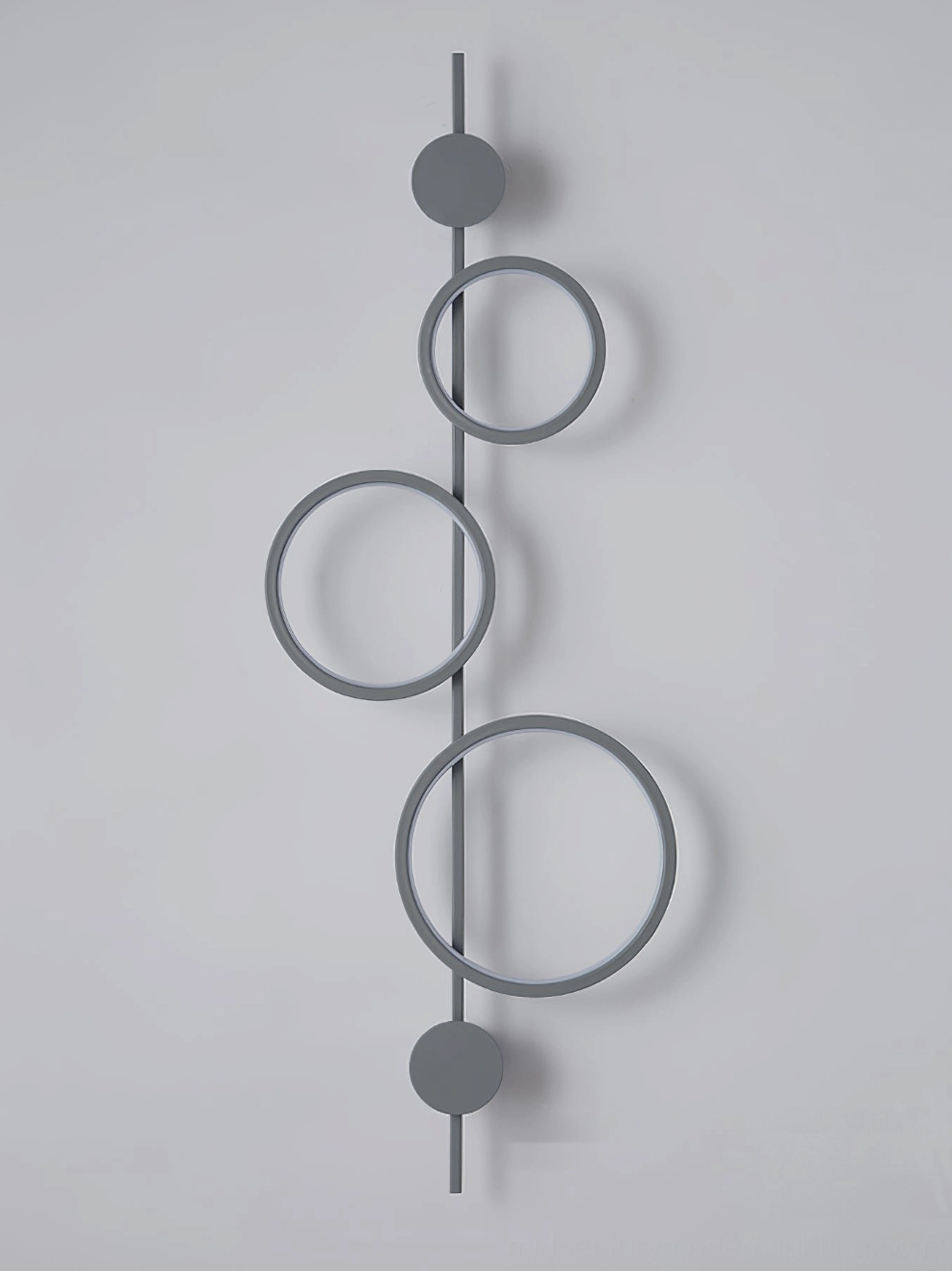 Jocco wall lamp creating ambient light and shadow interplay on interior wall design