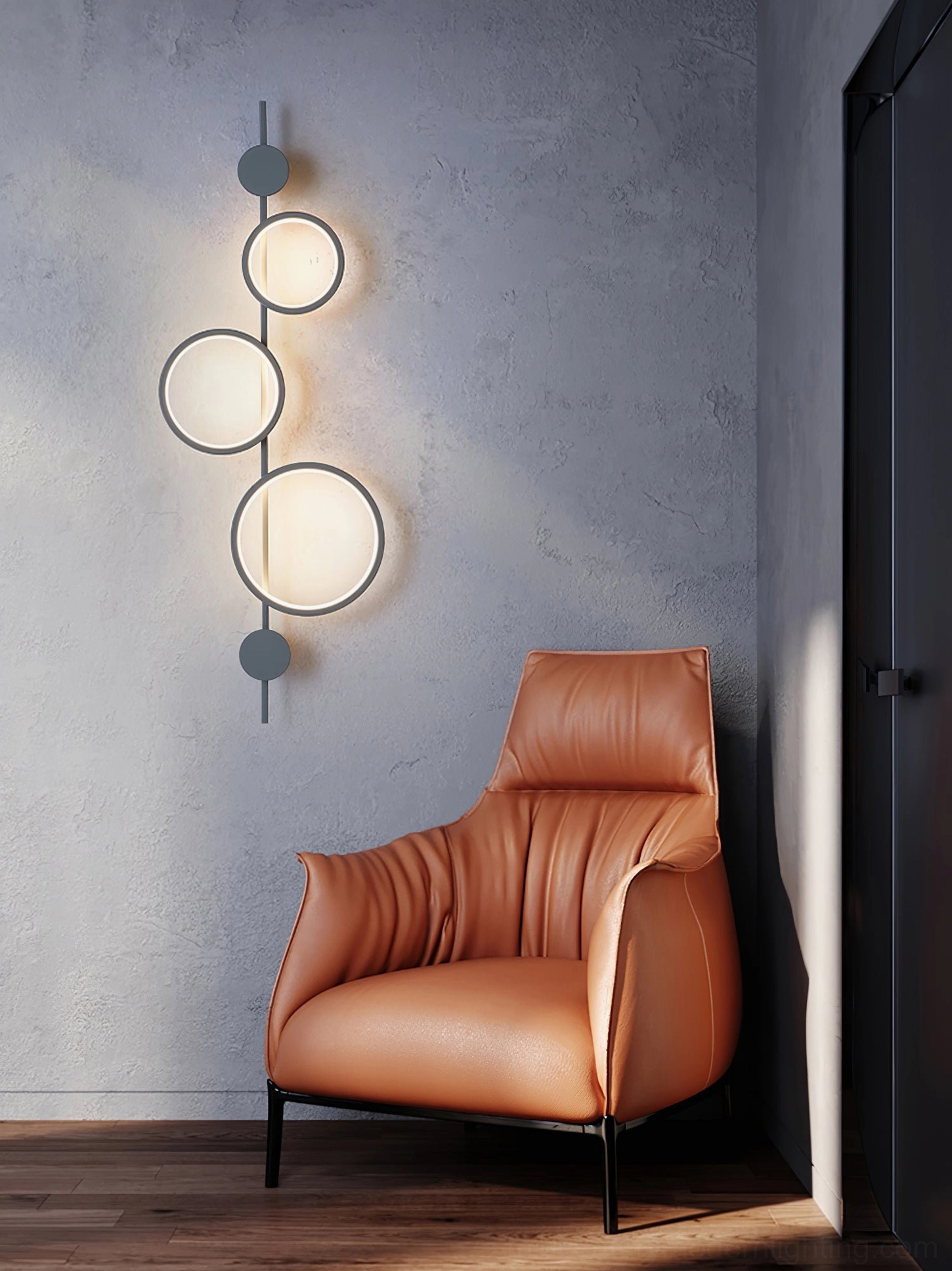 Jocco grey vertical wall lamp mounted in reading corner with warm white LED illumination