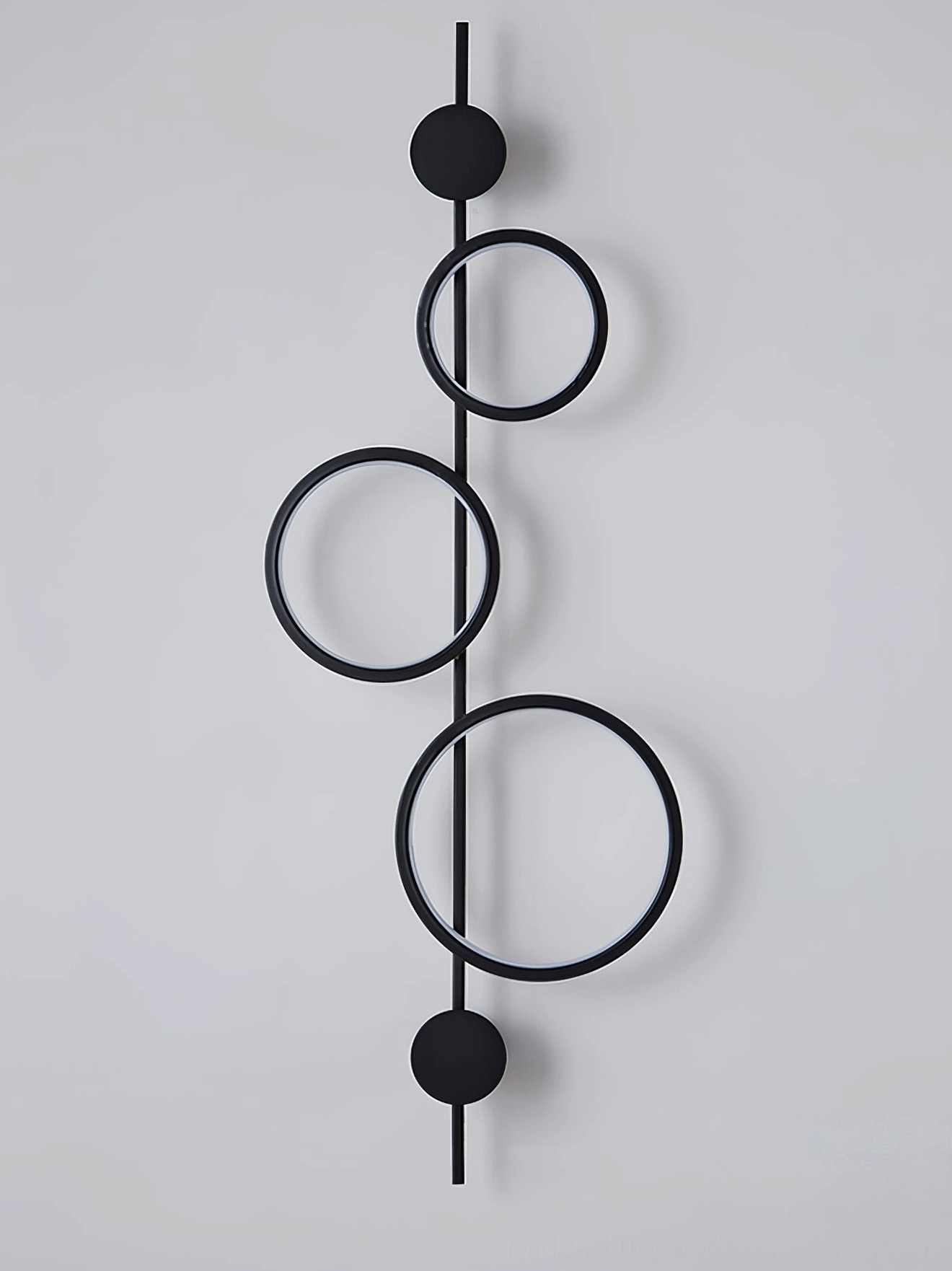 Jocco ring wall lamp mounted above console table minimalist entryway accent lighting