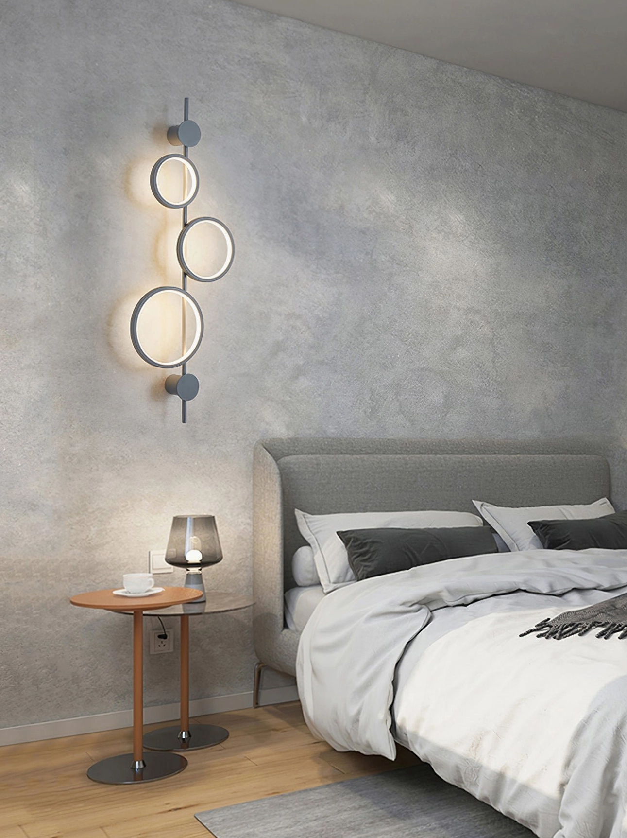 Jocco illuminated wall lamp showing shadow pattern effect on interior wall surface