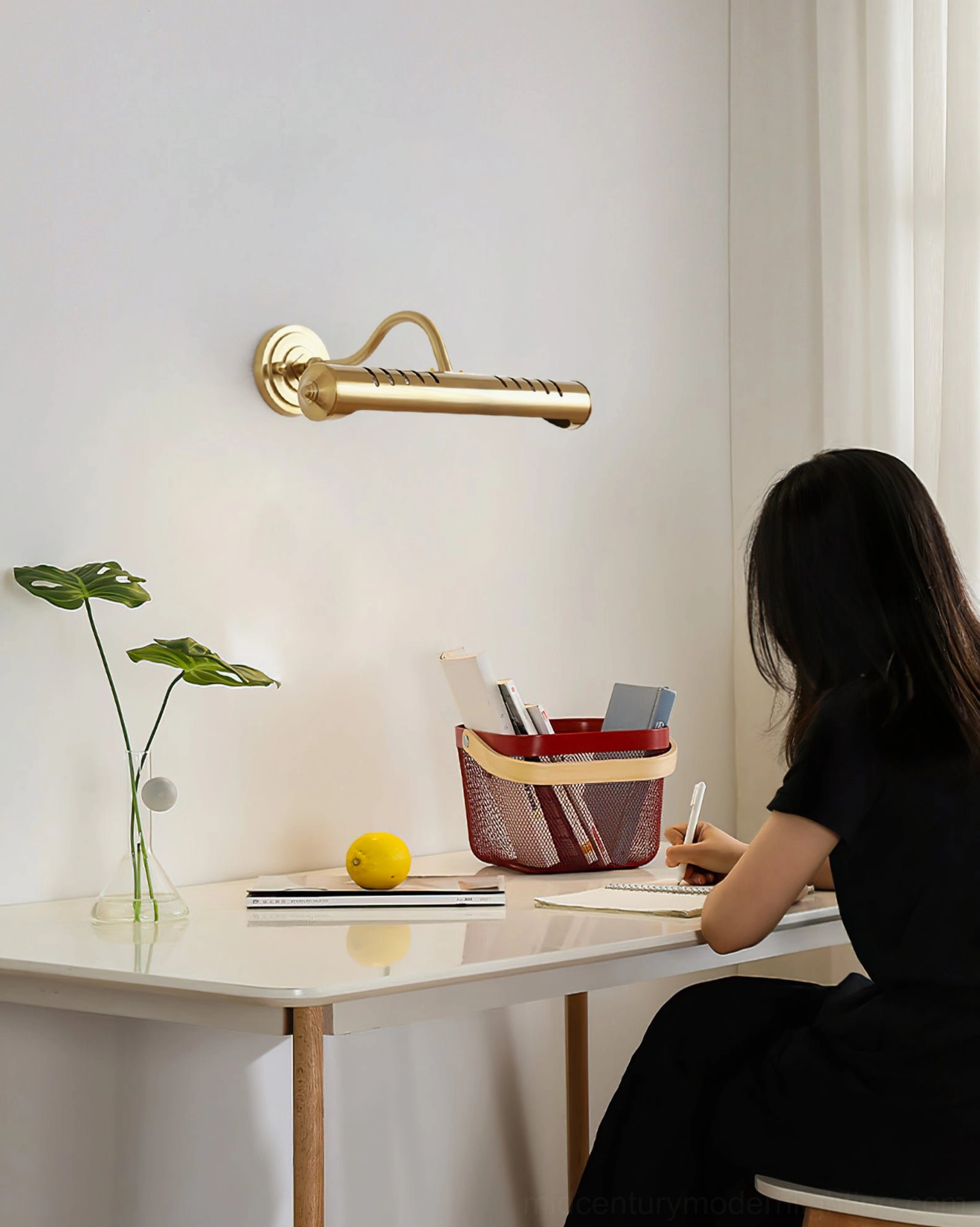 Joely mid-century modern wall sconce detail shot showcasing premium metal construction and finish quality
