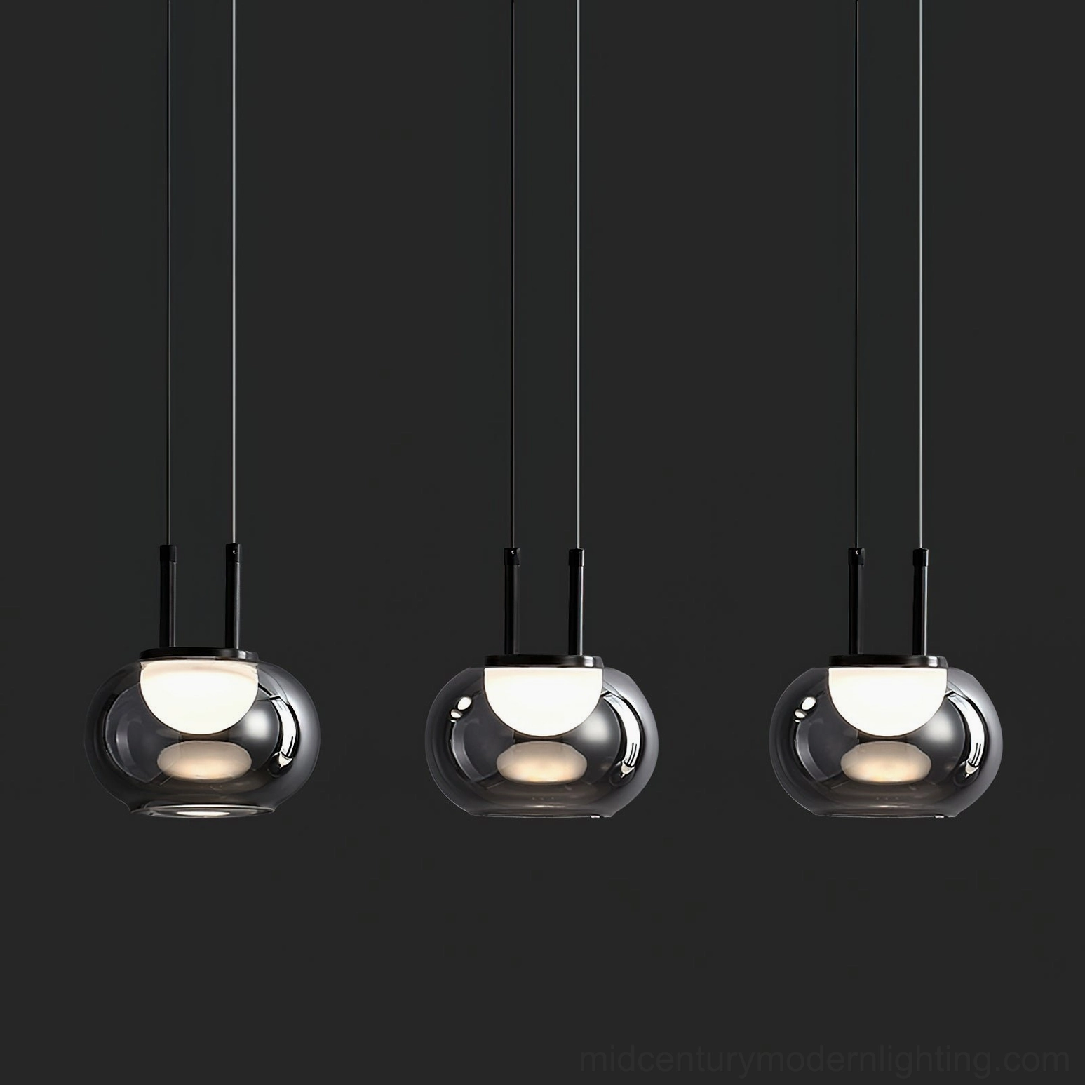 Trio of Johan pendant lights with matching smoked glass on black background