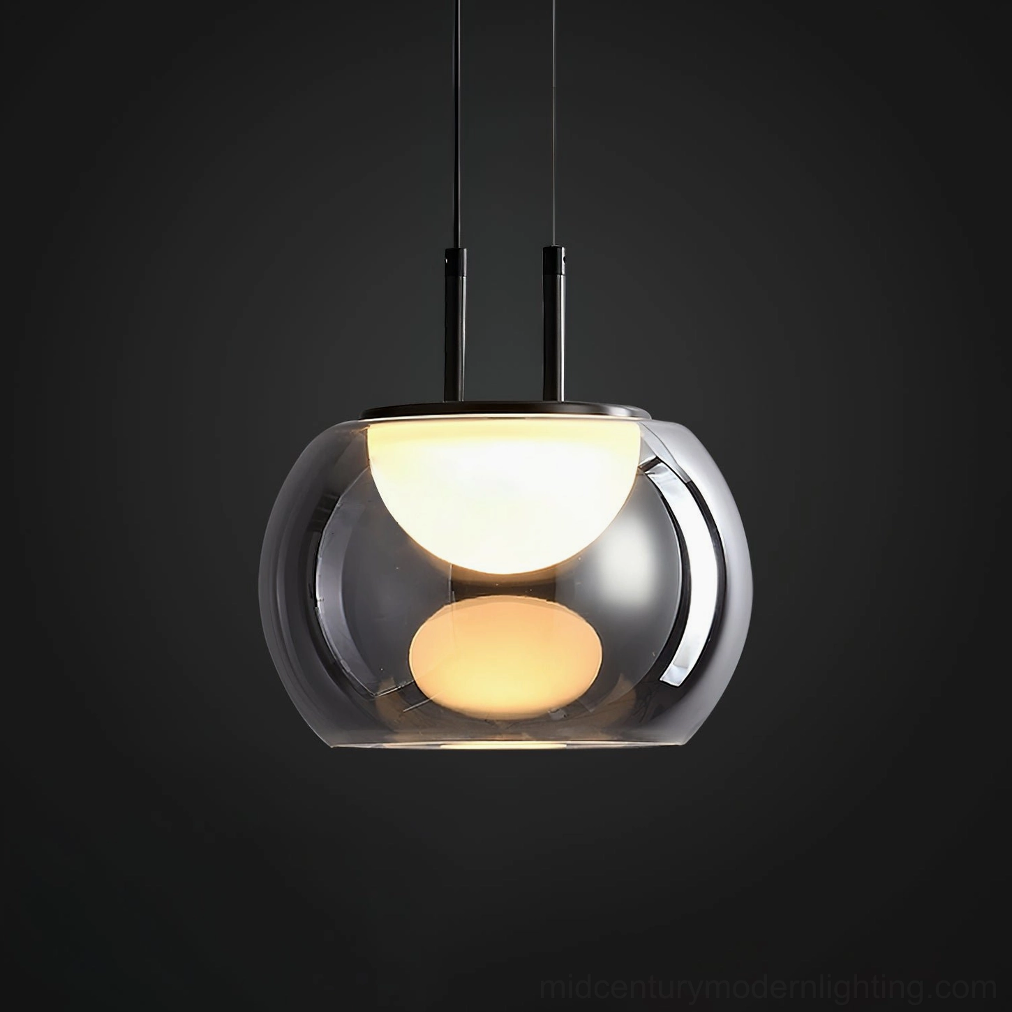 Johan pendant with exposed dual light sources glowing inside smoked glass