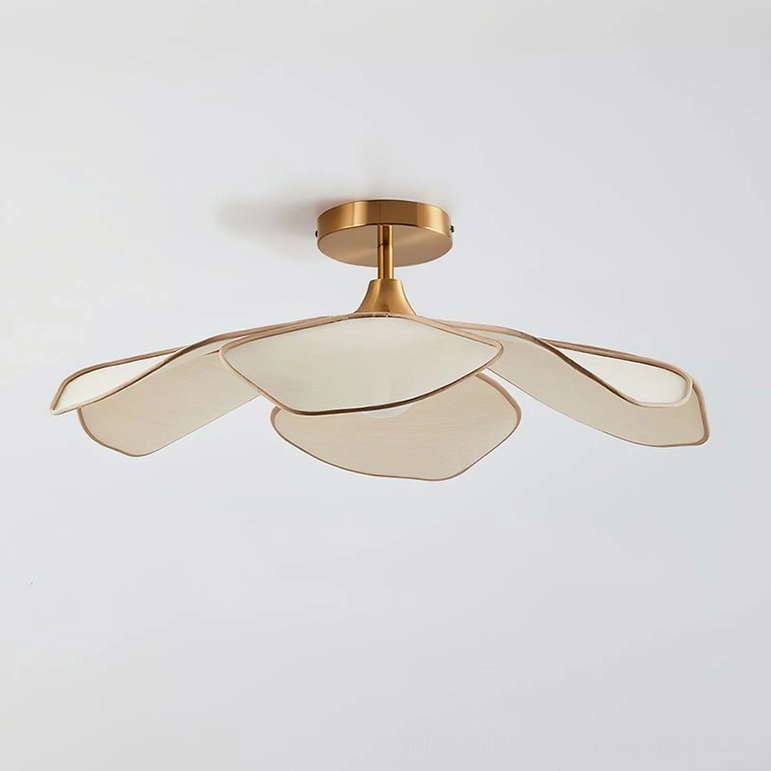 Joliette ceiling fixture angled front view with brass gold mount and neutral off-white raffia shades