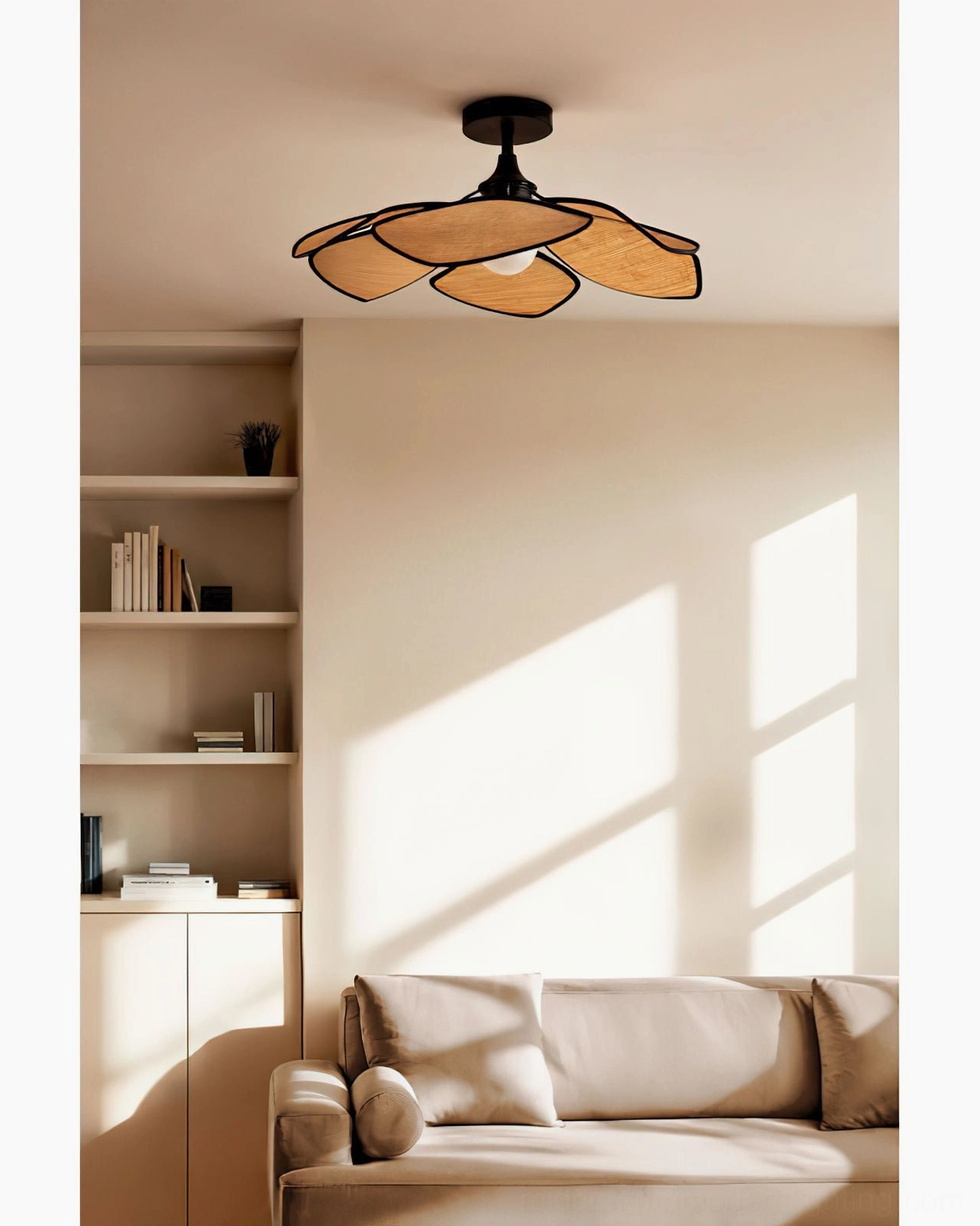 Joliette ceiling light illuminated in warm residential living room with ambient glow from raffia diffusion