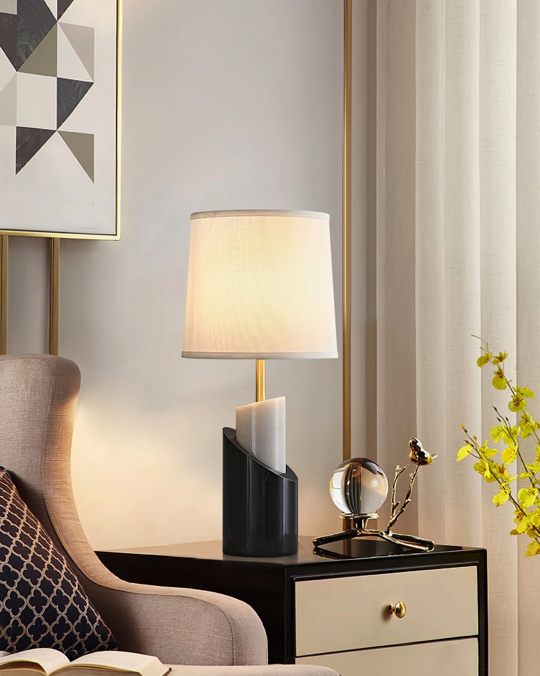Jude marble and brass lamp in living room side table corner with tufted armchair