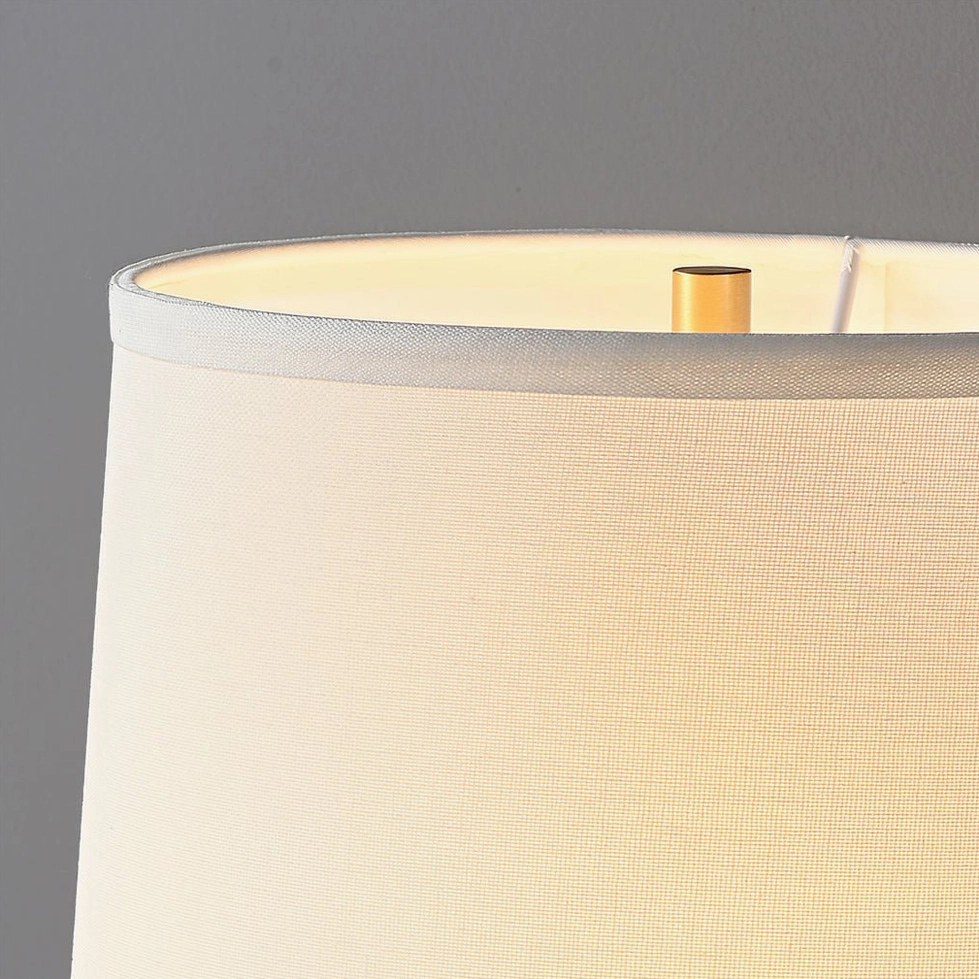 Jude linen fabric lampshade close-up with warm ambient light and brass fixture