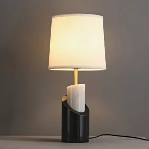 Jude table lamp bedside close-up with warm glowing linen shade and brass details