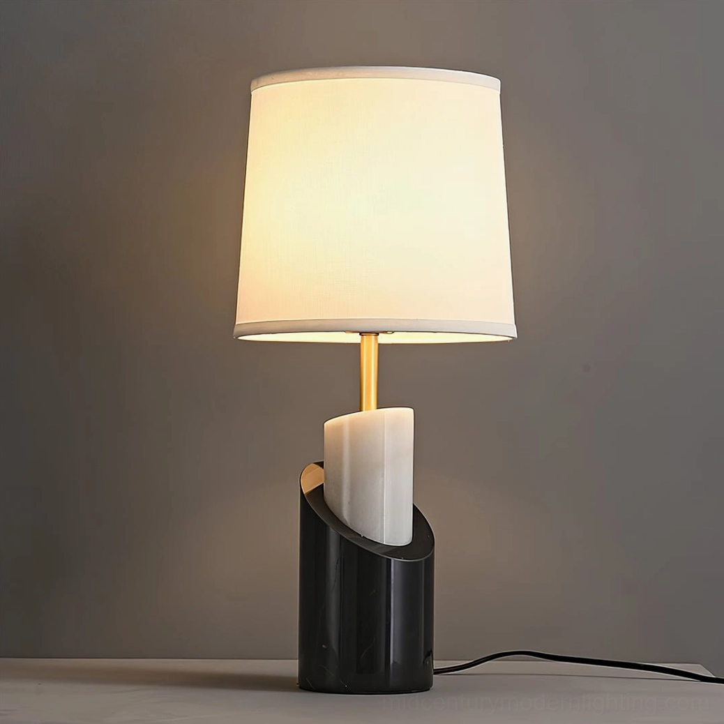 Jude table lamp bedside close-up with warm glowing linen shade and brass details