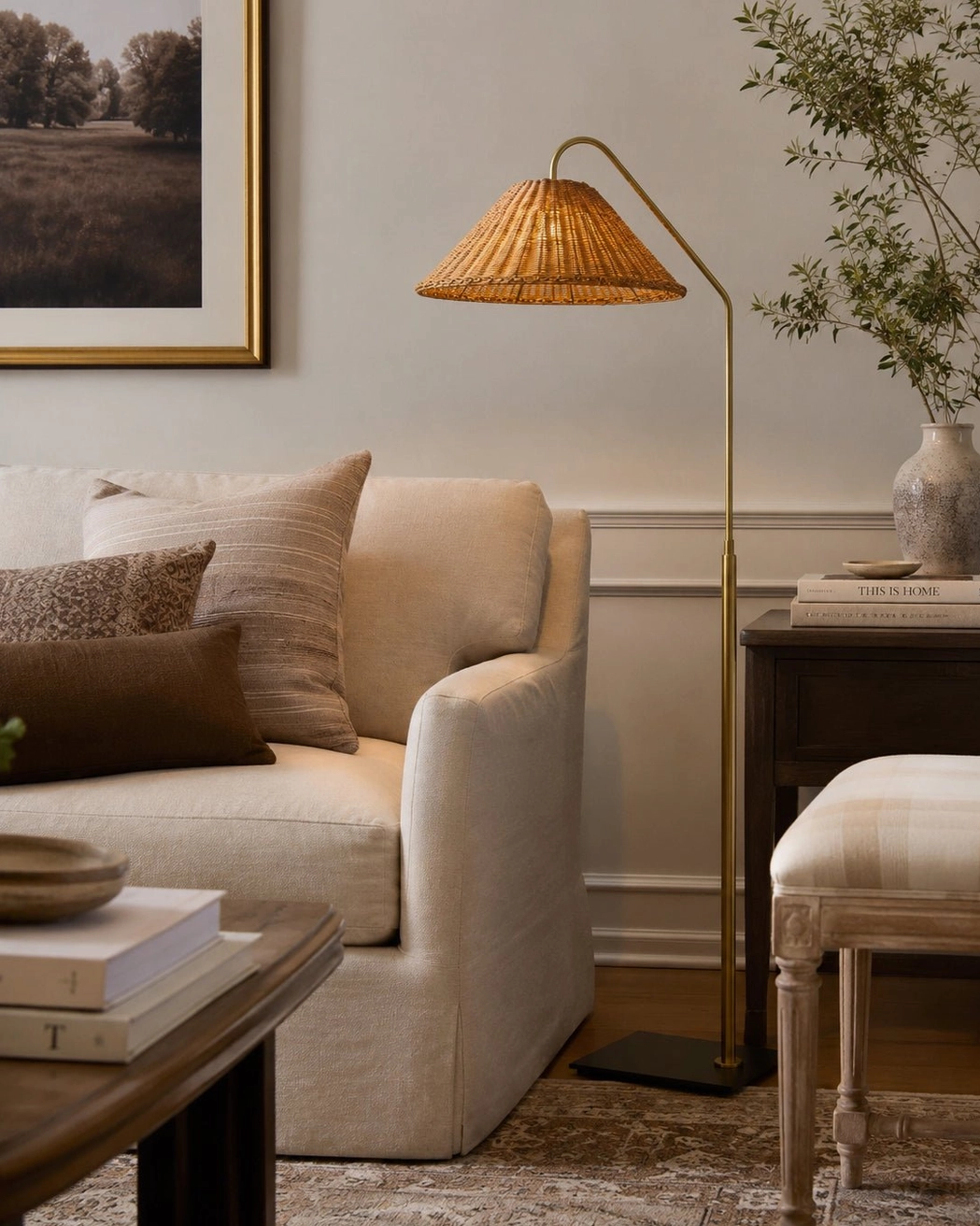Juno arc rattan floor lamp in modern neutral living room with minimalist bohemian home style, flat oblique view