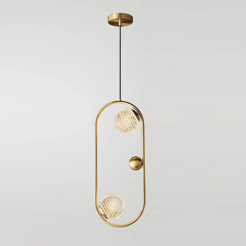 Jupiter oval brass pendant light, direct frontal view highlighting minimalist modern gold-toned design and clean silhouette