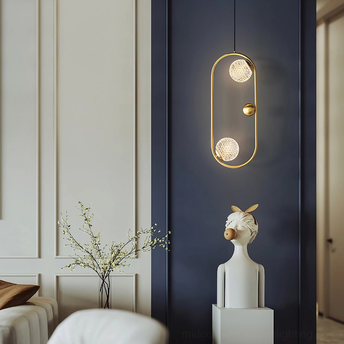 Jupiter brass pendant light in modern bedroom with paneled wall, demonstrating neutral luxury decor styling and ambient illumination