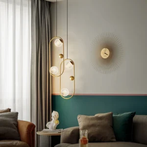 Pair of Jupiter brass pendant lights installed in modern luxury living room, demonstrating elegant cluster arrangement and warm ambient lighting