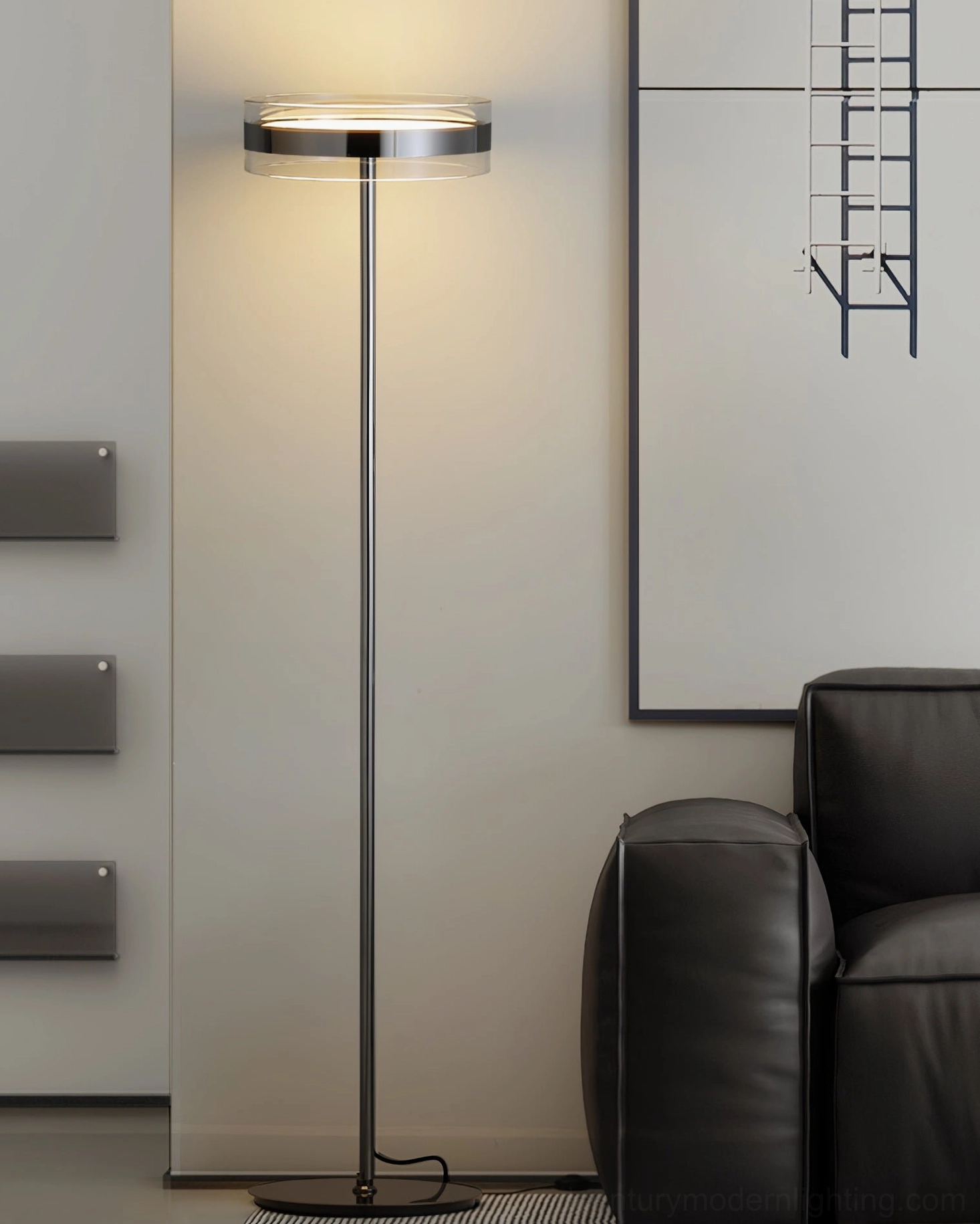 Black kaede torchiere floor lamp positioned in modern living room corner with sofa and contemporary wall decor