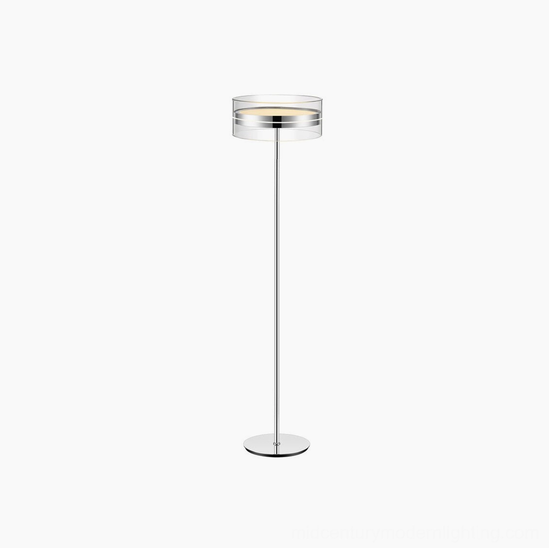 Kaede floor lamp in polished silver chrome finish with clear glass shade creating elegant warm light in modern interior