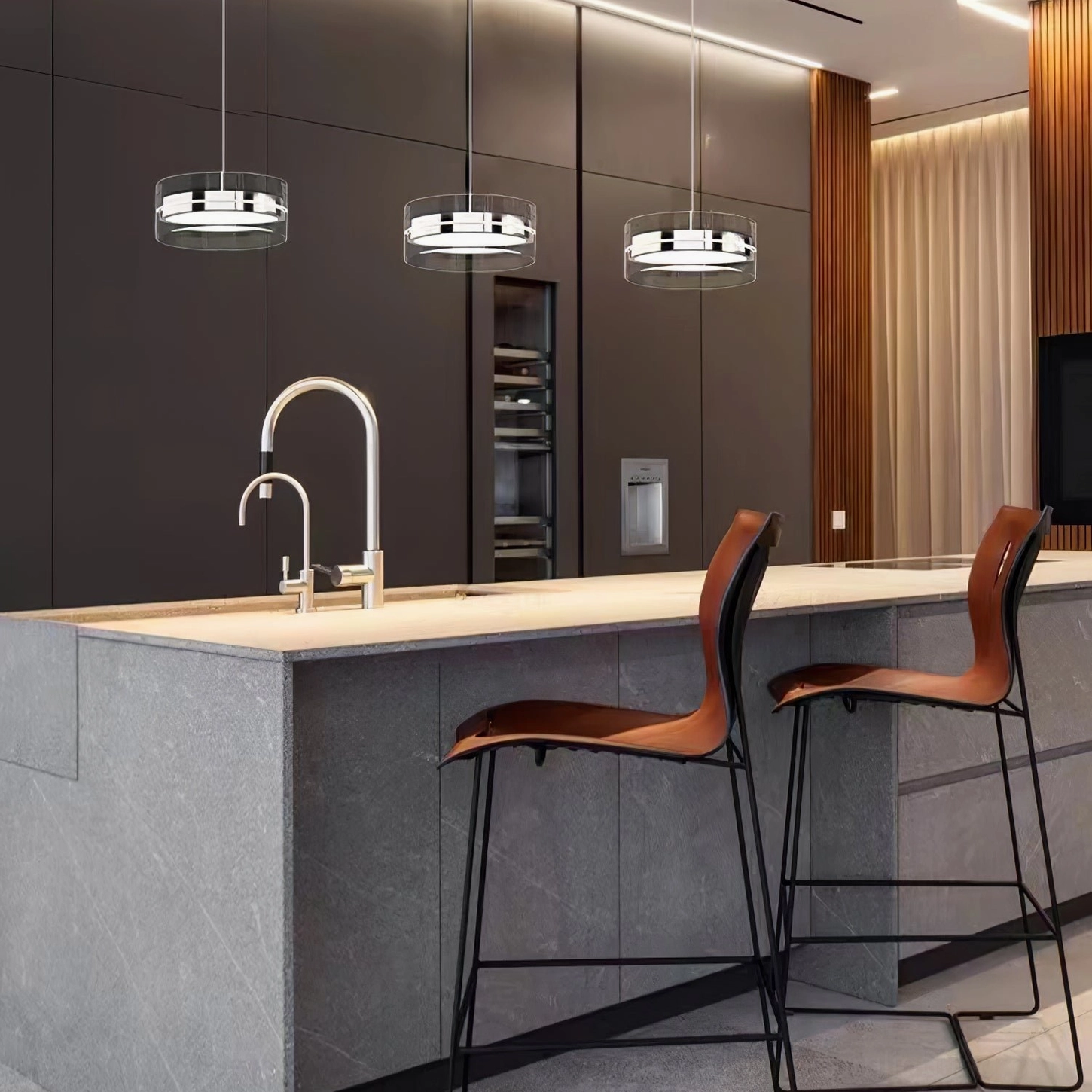 Triple Kaede ring pendant lights suspended above kitchen bar counter with dark brown modern cabinetry