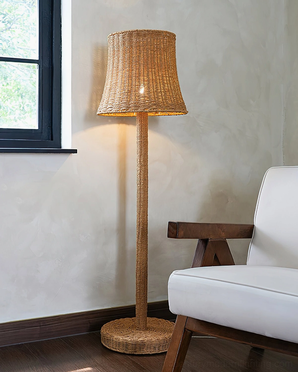 Kakasi floor lamp by sunlit window next to white sofa, natural daylight ambient home lighting