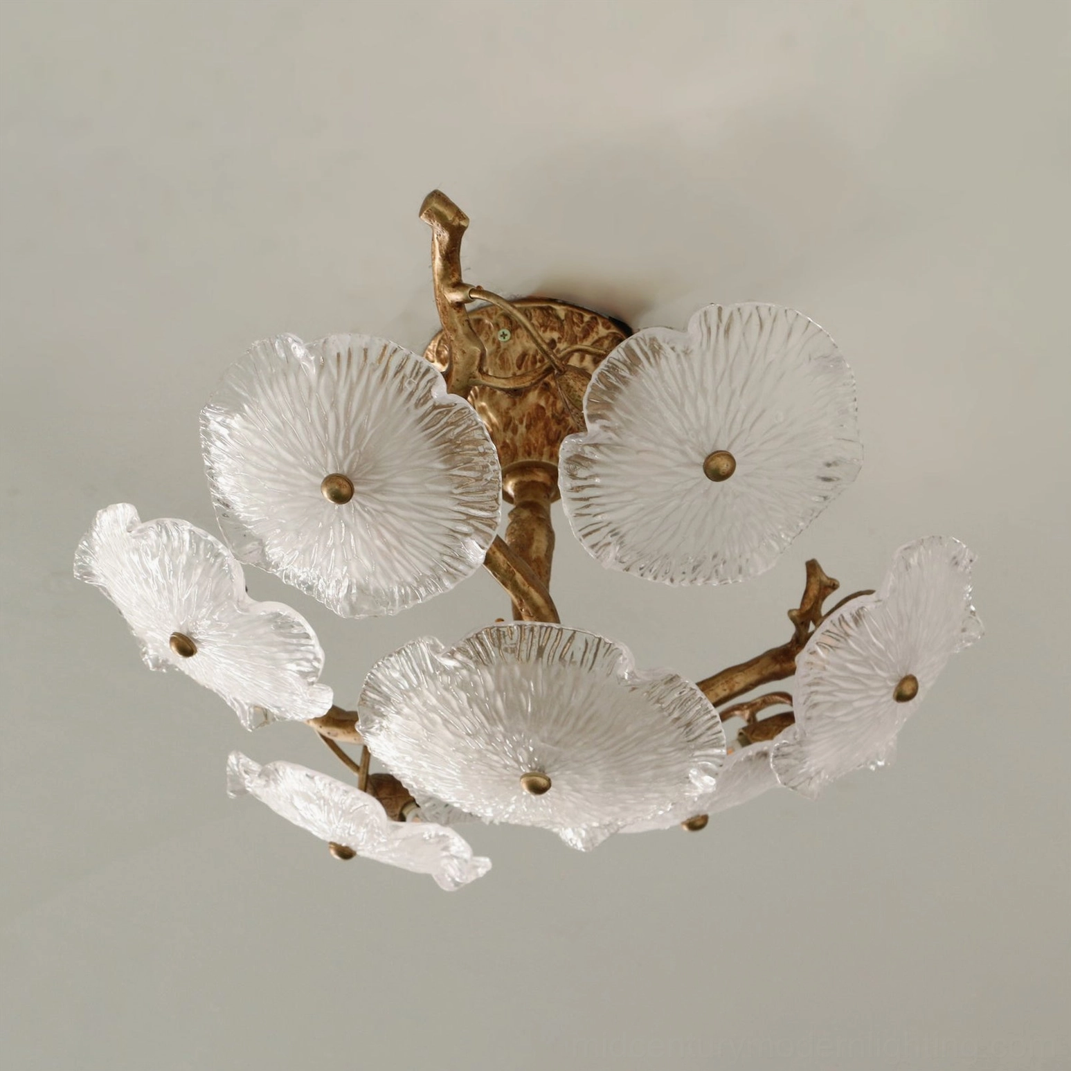 Kamal ceiling lamp showing G9 bulb compatibility and interior glass petal arrangement