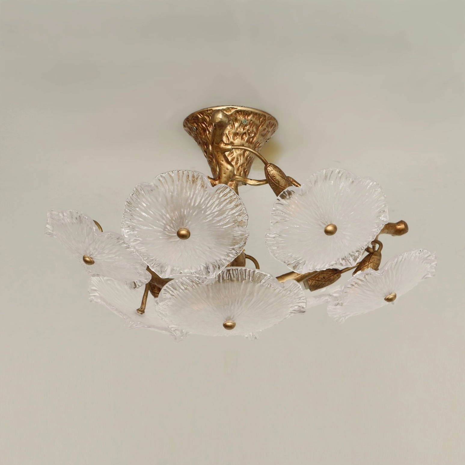 Kamal lotus-inspired ceiling light with hand-blown glass petals arranged in botanical pattern