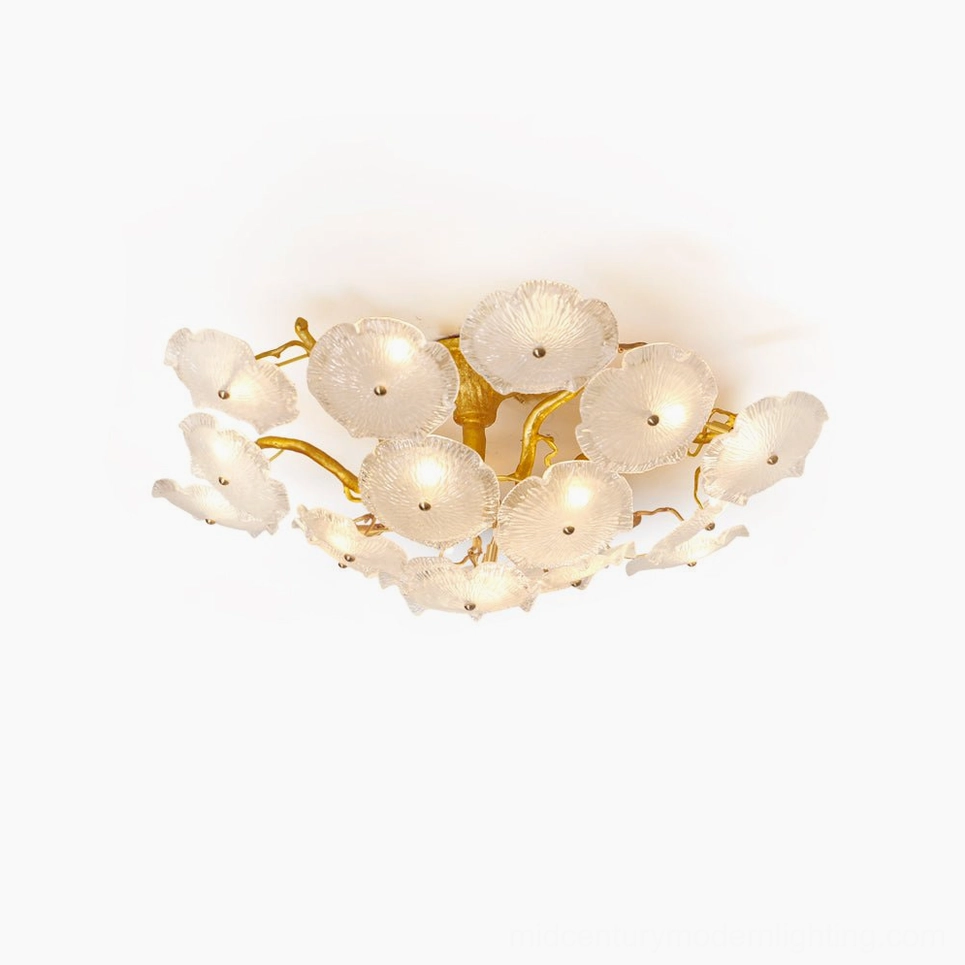 Kamal lotus flush mount ceiling lamp with hand-blown glass petals and antiqued brass frame, overhead studio view