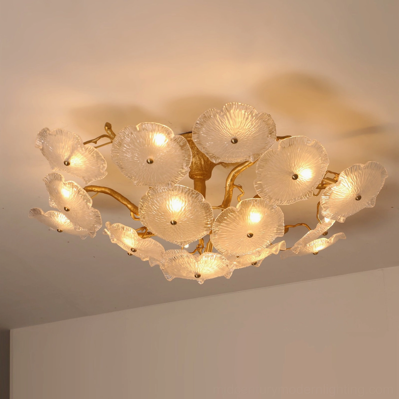 Fully assembled Kamal lotus ceiling light with all glass petals, warm white interior space