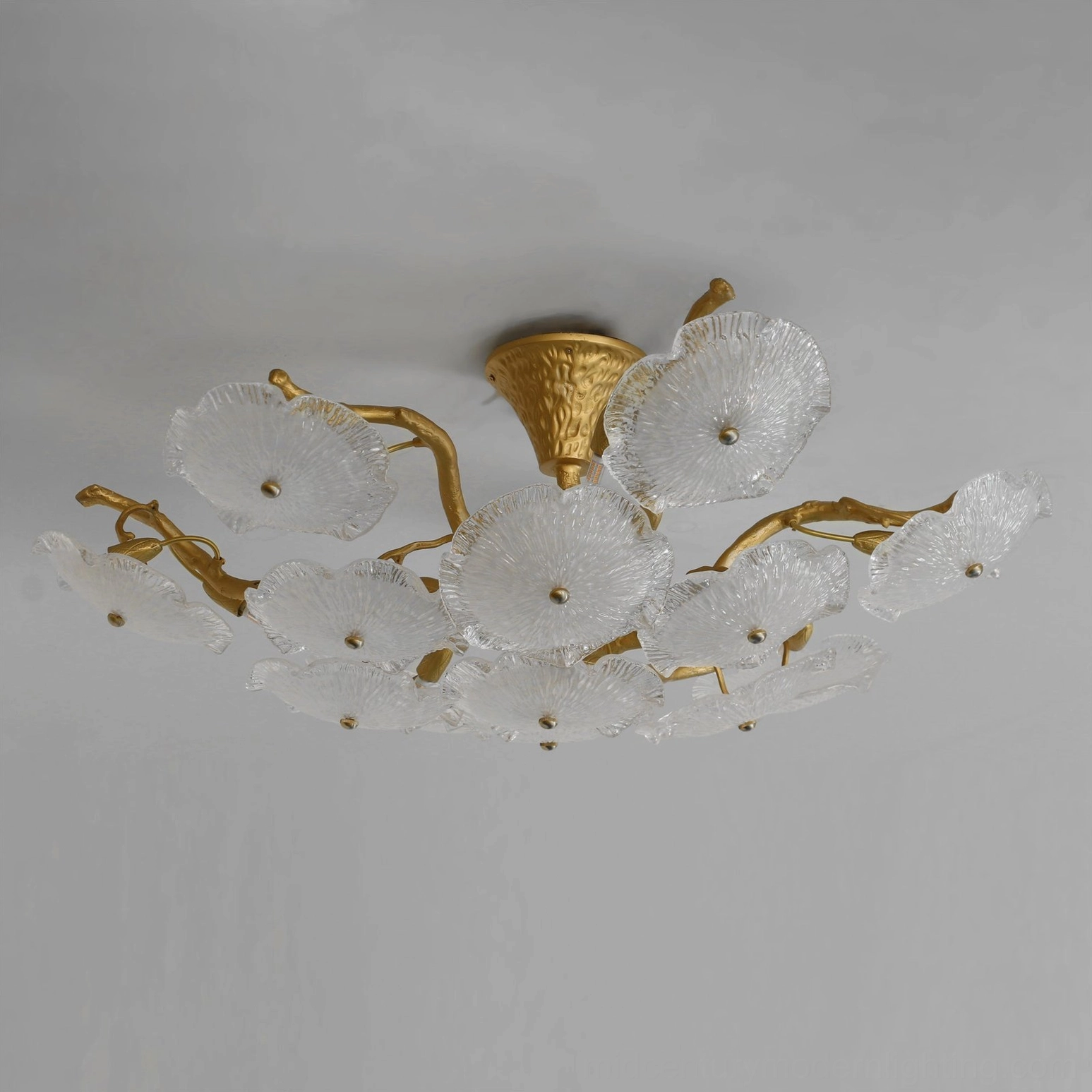 Unlit Kamal lotus ceiling lamp with frosted clear glass, low-profile design side view