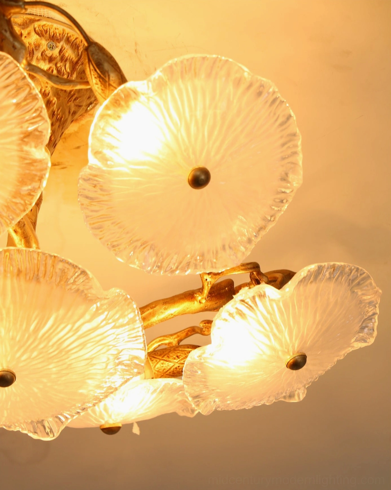 Kamal ceiling lamp featuring sculptural brass and textured glass, artisanal flush mount fixture