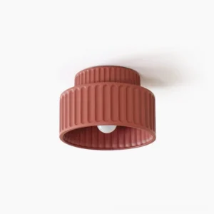 Kami ribbed resin ceiling lamp with terracotta matte finish, front view showing two-tier fluted design and exposed E27 bulb